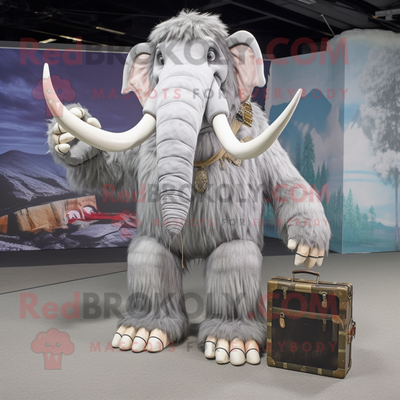 Silver Mammoth mascot costume character dressed with a Bikini and Messenger bags Silver Mammoth mascot costume character dressed with a Bikini and Messenger bags