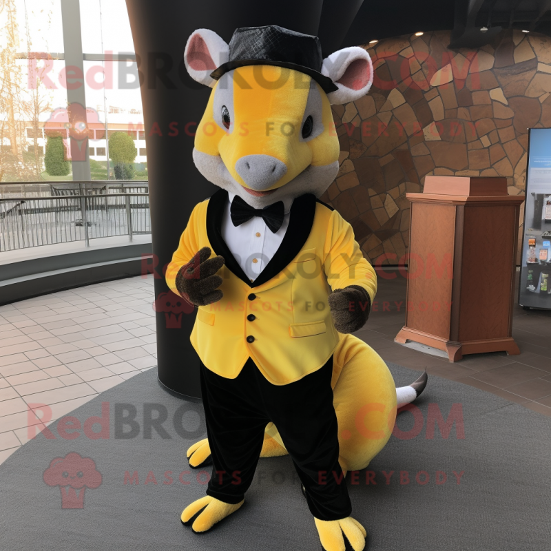 Yellow Armadillo mascot costume character dressed with a Tuxedo and Mittens