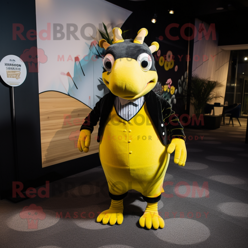 Yellow Armadillo mascot costume character dressed with a Tuxedo and Mittens Yellow Armadillo mascot costume character dressed with a Tuxedo and Mittens