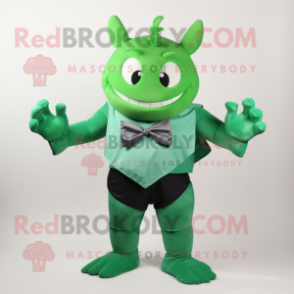 Green Devil mascot costume character dressed with a Tank Top and Bow ties