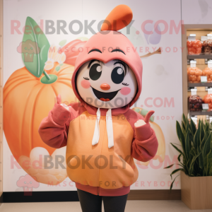 Peach But mascot costume character dressed with a Sweatshirt and Beanies