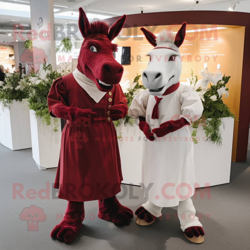 Maroon Donkey mascot costume character dressed with a Wedding Dress and Cufflinks Maroon Donkey mascot costume character dressed with a Wedding Dress and Cufflinks