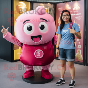 Magenta Dim Sum mascot costume character dressed with a Denim Shorts and Smartwatches