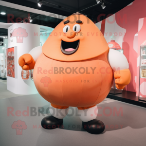 Peach Strongman mascot costume character dressed with a Shorts and Foot pads