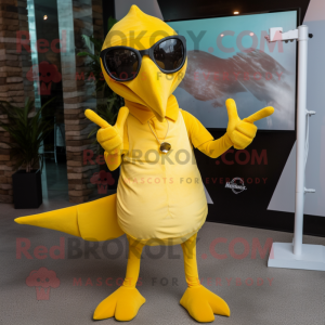 Lemon Yellow Pterodactyl mascot costume character dressed with a Henley Tee and Sunglasses