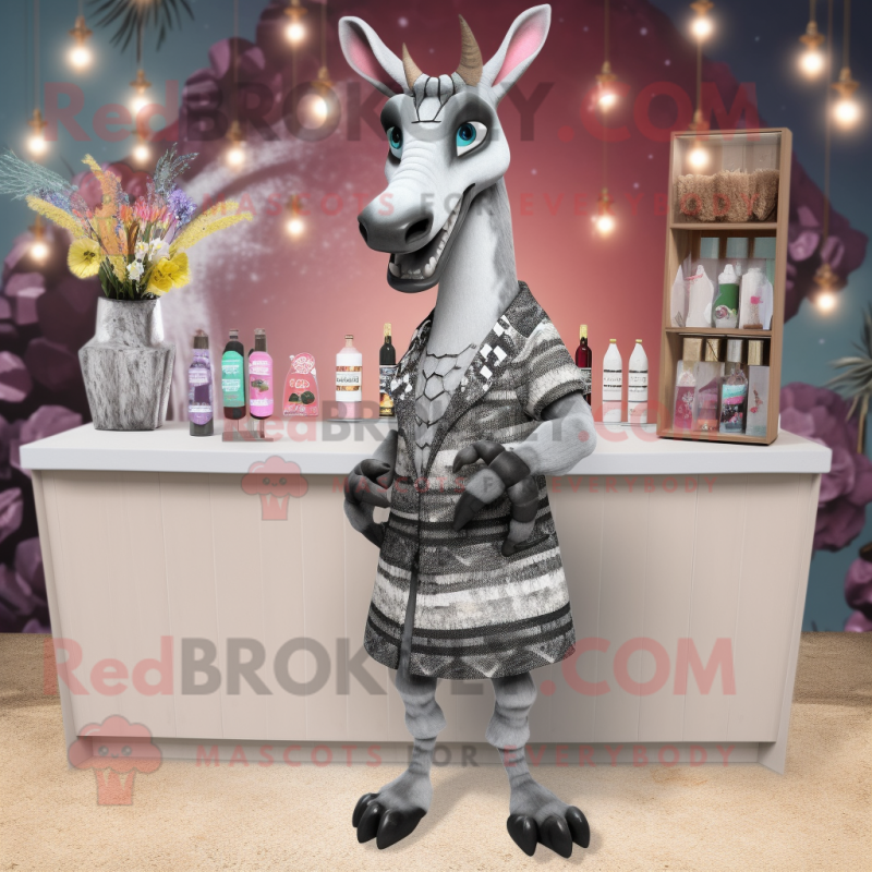 Silver Okapi mascot costume character dressed with a Cocktail Dress and Lapel pins Silver Okapi mascot costume character dressed with a Cocktail Dress and Lapel pins