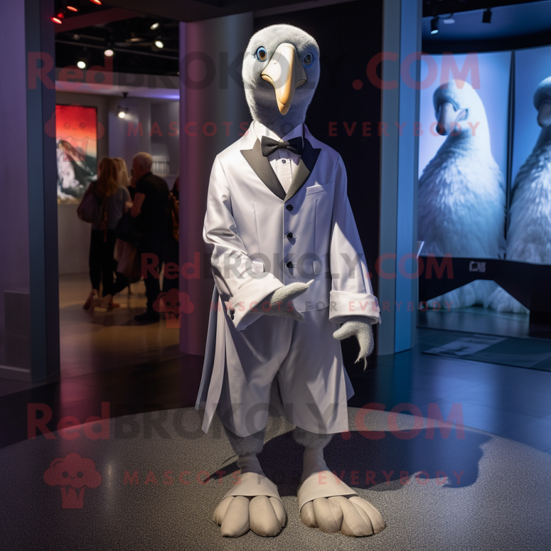 Silver Albatross mascot costume character dressed with a Coat and Bow ties Silver Albatross mascot costume character dressed with a Coat and Bow ties