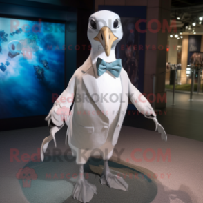 Silver Albatross mascot costume character dressed with a Coat and Bow ties