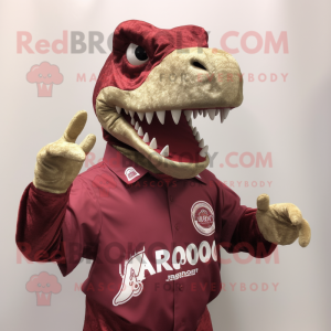 Maroon Allosaurus mascot costume character dressed with a Graphic Tee and Cufflinks