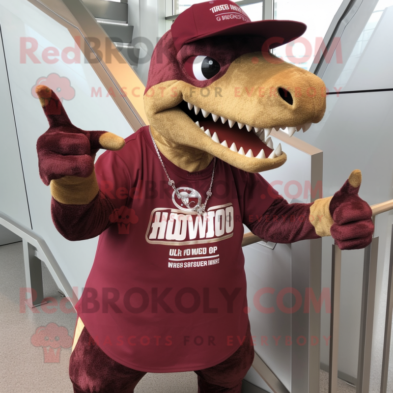 Maroon Allosaurus mascot costume character dressed with a Graphic Tee and Cufflinks