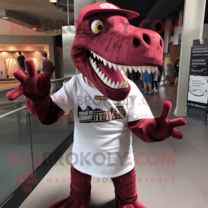 Maroon Allosaurus mascot costume character dressed with a Graphic Tee and Cufflinks