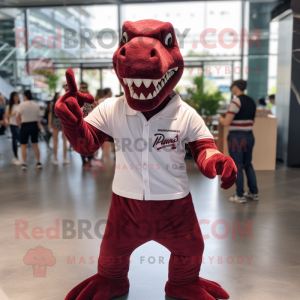 Maroon Allosaurus mascot costume character dressed with a Graphic Tee and Cufflinks