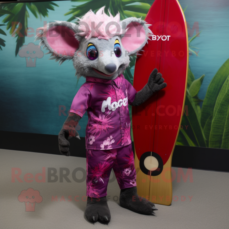 Magenta Aye-Aye mascot costume character dressed with a Rash Guard and Pocket squares