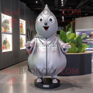 Silver Pear mascot costume character dressed with a Bomber Jacket and Shawls