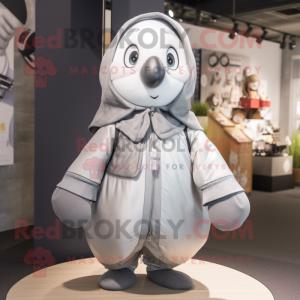 Silver Pear mascot costume character dressed with a Bomber Jacket and Shawls