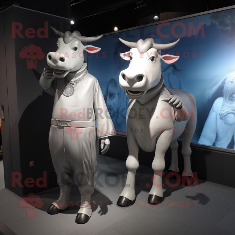 Silver Zebu mascot costume character dressed with a Culottes and Watches Silver Zebu mascot costume character dressed with a Culottes and Watches