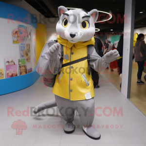 Gray Weasel mascot costume character dressed with a Raincoat and Messenger bags