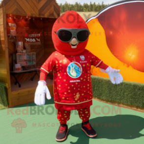 Red Shakshuka mascot costume character dressed with a Rash Guard and Sunglasses