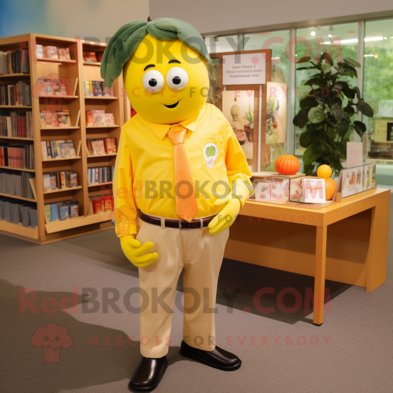 Yellow Mango mascot costume character dressed with a Poplin Shirt and Brooches Yellow Mango mascot costume character dressed with a Poplin Shirt and Brooches