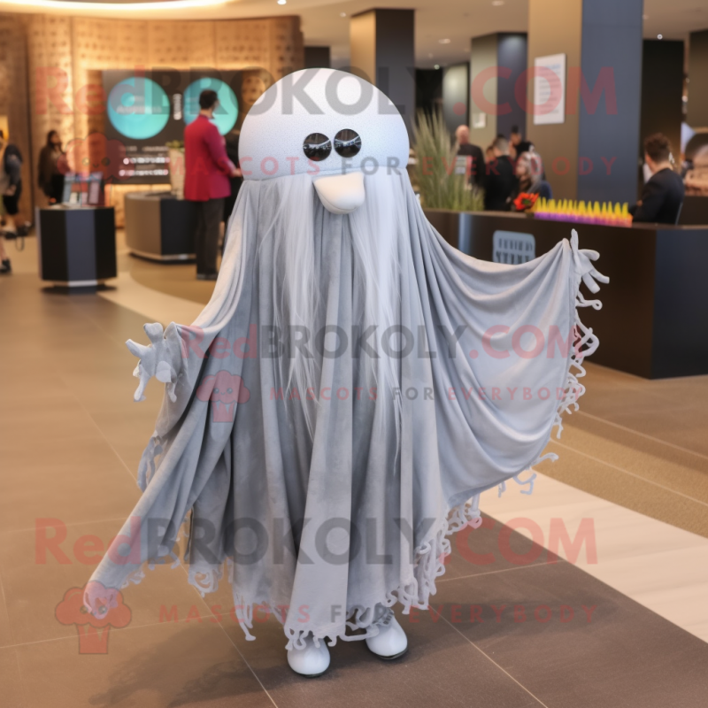 Gray Jellyfish mascot costume character dressed with a Maxi Skirt and Shawl pins