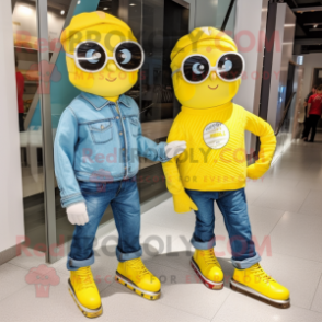 Lemon Yellow Pair Of Ice Skates mascot costume character dressed with a Chambray Shirt and Sunglasses