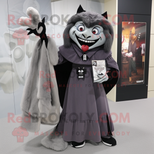 Gray Vampire mascot costume character dressed with a A-Line Dress and Messenger bags