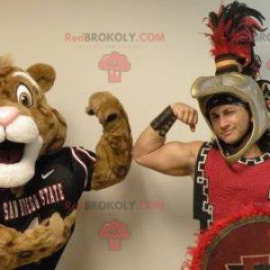 Brown and white tiger mascot in sportswear - Redbrokoly.com