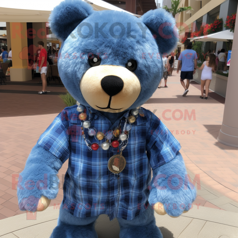 Blue Teddy Bear mascot costume character dressed with a Flannel Shirt and Necklaces Blue Teddy Bear mascot costume character dressed with a Flannel Shirt and Necklaces