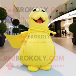 Lemon Yellow Whale mascot costume character dressed with a Evening Gown and Belts