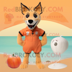 Peach Dingo mascot costume character dressed with a Swimwear and Brooches