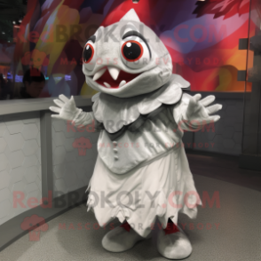 Silver Piranha mascot costume character dressed with a Wrap Skirt and Mittens