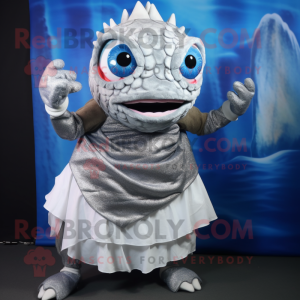 Silver Piranha mascot costume character dressed with a Wrap Skirt and Mittens