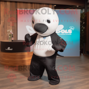Black Beluga Whale mascot costume character dressed with a Polo Shirt and Belts