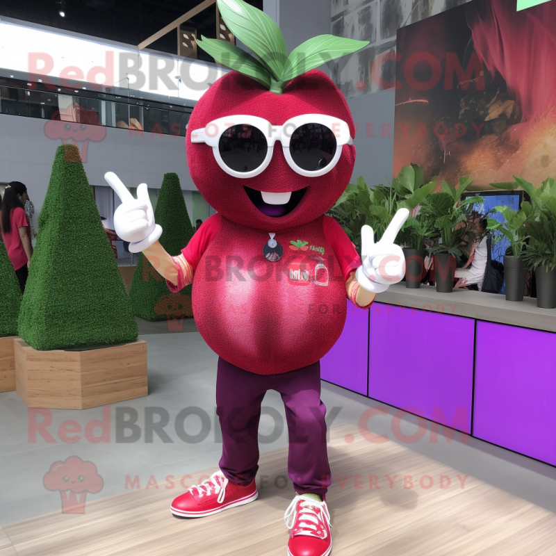 Magenta Apple mascot costume character dressed with a Jeans and Sunglasses Magenta Apple mascot costume character dressed with a Jeans and Sunglasses