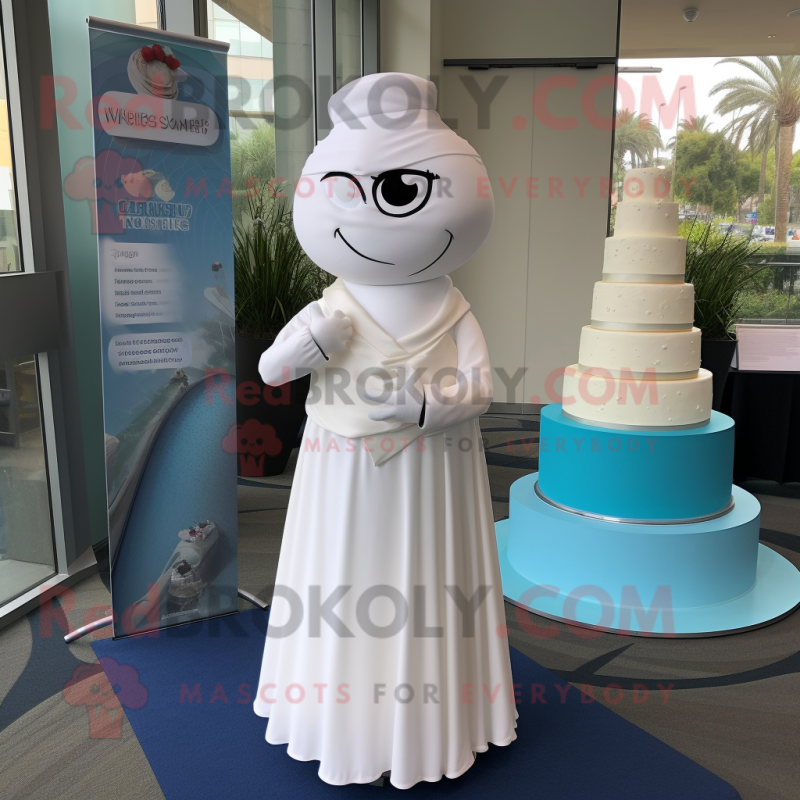 White Wedding Cake mascot costume character dressed with a Shift Dress and Shawl pins