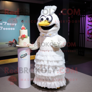 White Wedding Cake mascot costume character dressed with a Shift Dress and Shawl pins