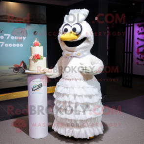 White Wedding Cake mascot costume character dressed with a Shift Dress and Shawl pins