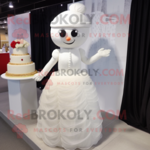 White Wedding Cake mascot costume character dressed with a Shift Dress and Shawl pins