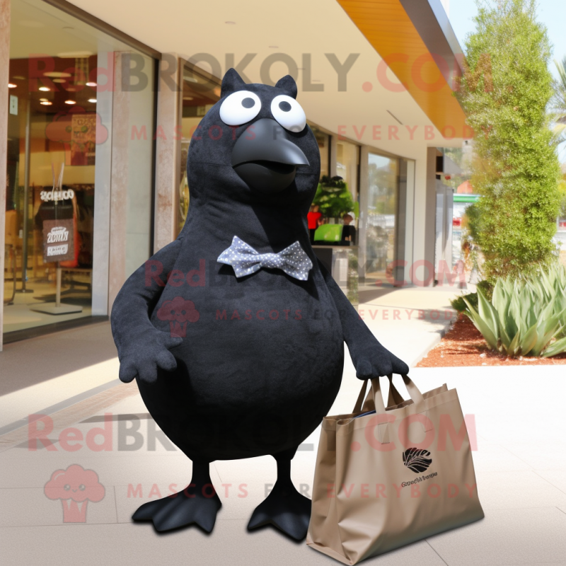 Black Quail mascot costume character dressed with a Suit and Tote bags