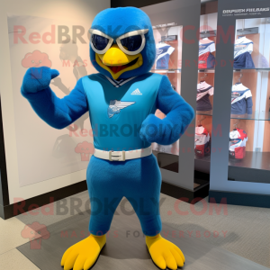 Blue Hawk mascot costume character dressed with a Rash Guard and Bracelets