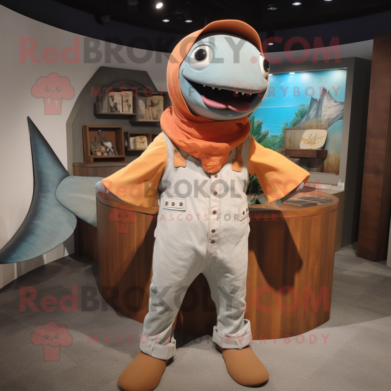 Rust Swordfish mascot costume character dressed with a Overalls and Shawls Rust Swordfish mascot costume character dressed with a Overalls and Shawls