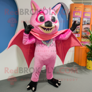 Pink Fruit Bat mascot costume character dressed with a Jeggings and Rings