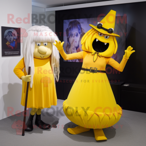 Yellow Witch mascot costume character dressed with a Shift Dress and Ties