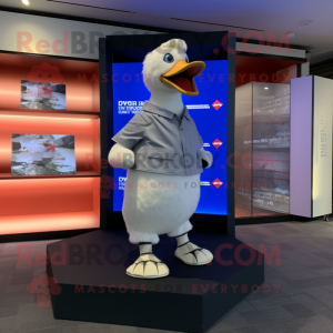 Silver Muscovy Duck mascot costume character dressed with a V-Neck Tee and Foot pads