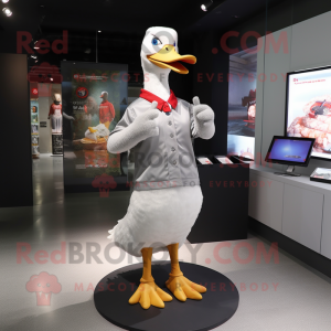 Silver Muscovy Duck mascot costume character dressed with a V-Neck Tee and Foot pads