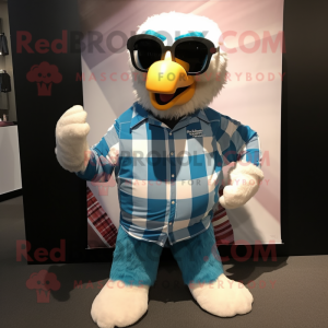 Cyan Eagle mascot costume character dressed with a Flannel Shirt and Eyeglasses