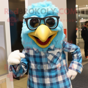 Cyan Eagle mascot costume character dressed with a Flannel Shirt and Eyeglasses