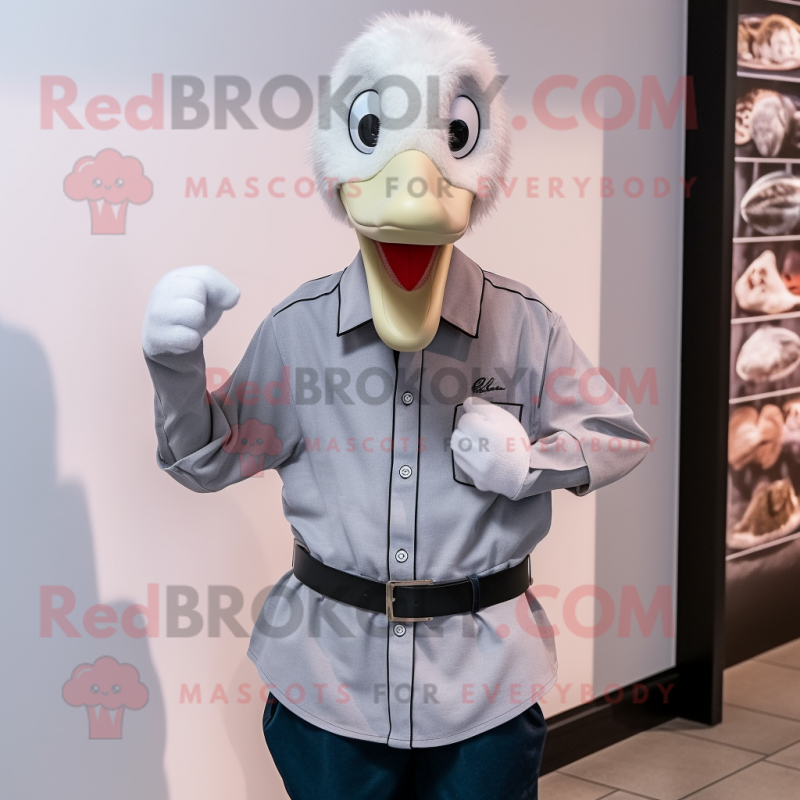 Gray Swans mascot costume character dressed with a Oxford Shirt and Bracelet watches