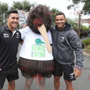Mascotte de gros oiseau marron de kiwi tout poilu -