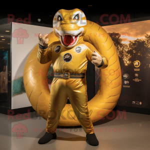 Gold Titanoboa mascot costume character dressed with a Rash Guard and Rings